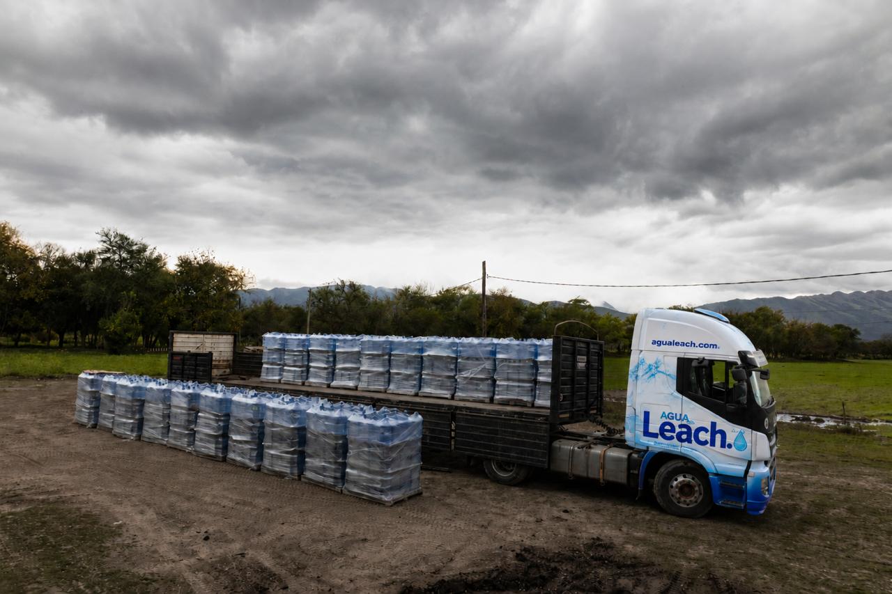 Agua Leach delivery truck loaded with jugs